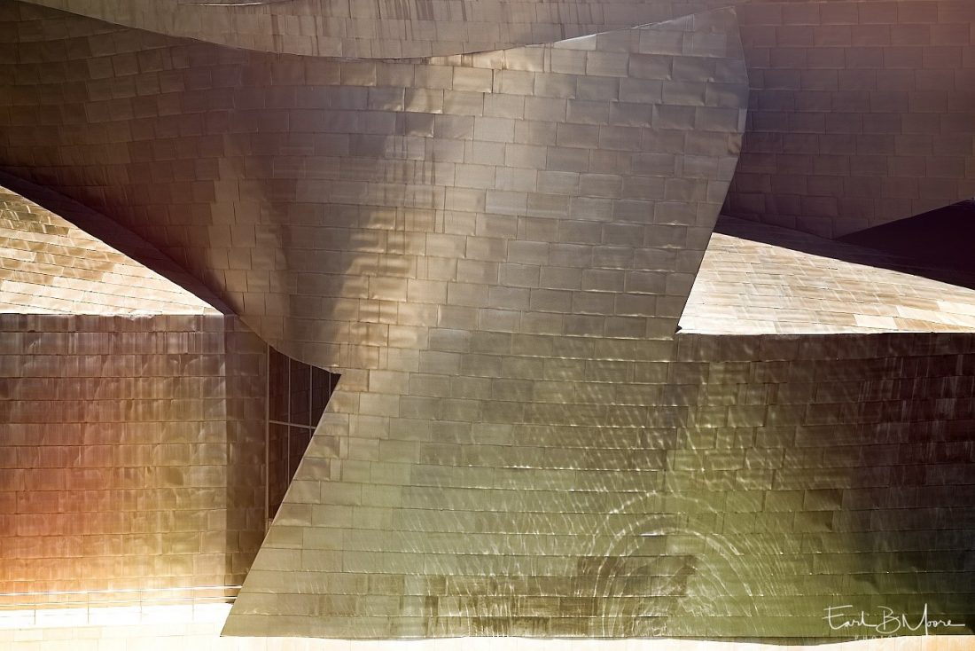 The flowing shapes of the metallic walls at the Guggenheim Museum, Bilbao, Spain